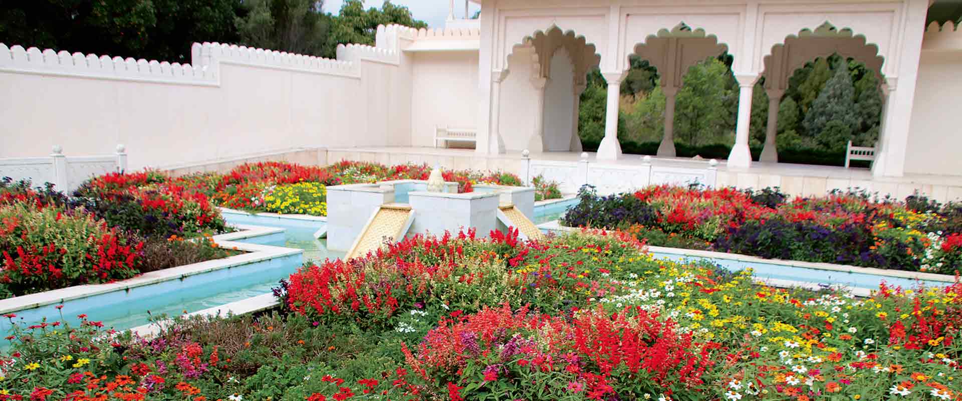india themed garden flowers water feature hamilton, new zealand